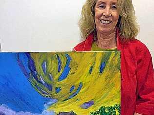 FRENCH FLAVOUR: Pamela Pease with her painting Trekking to Mt Cooroora! Picture: Contributed