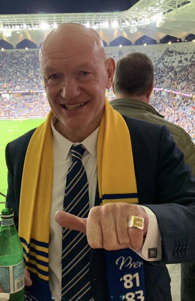 Parramatta legend Peter Wynn with one of his premiership rings.