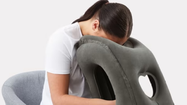 Kmart delights jetsetters with its inflatable front travel pillow