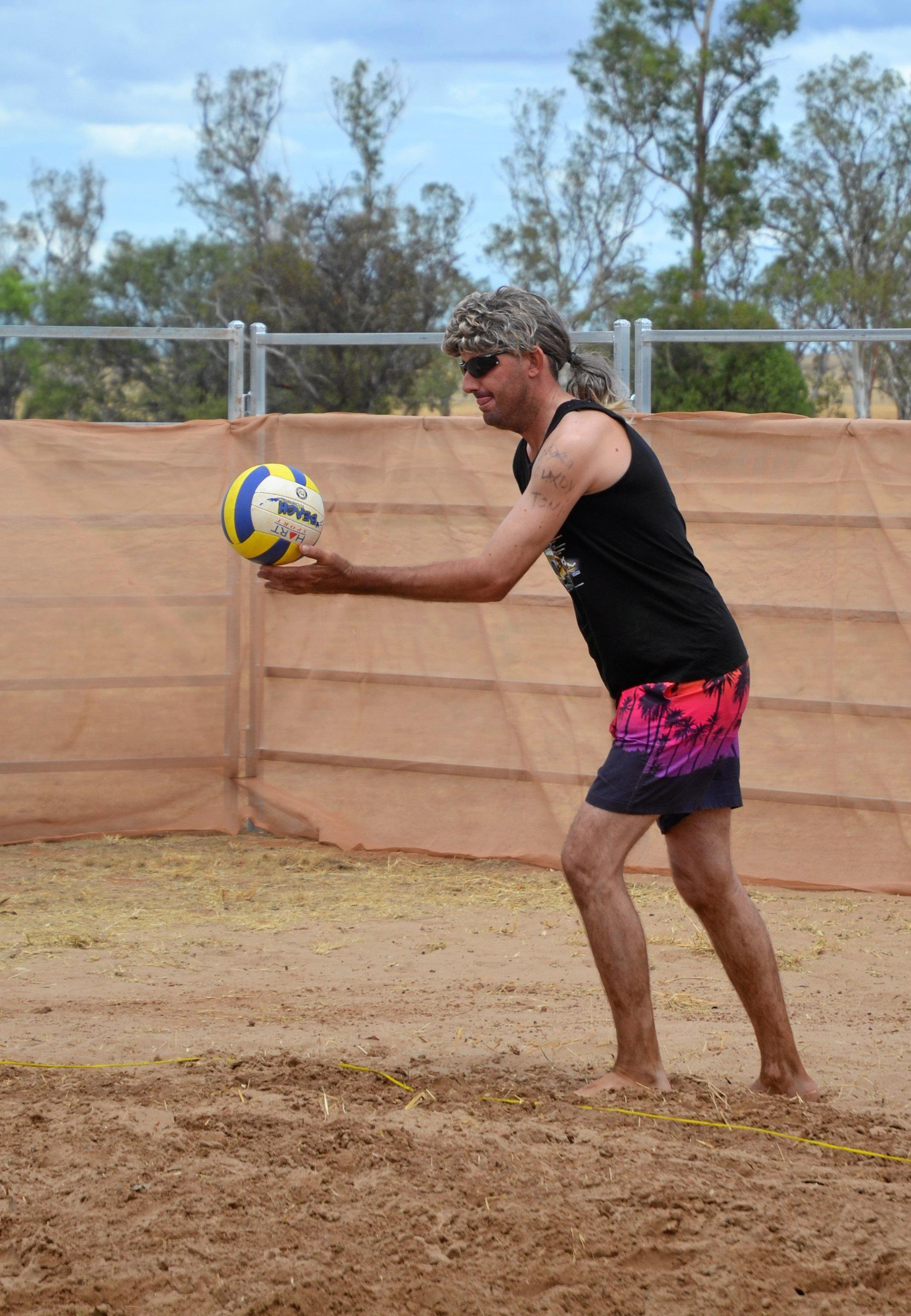 Wayne Becker giving it a crack at the Dulacca Sports Club annual Bush Beach Volleyball tournament. Picture: Kate McCormack