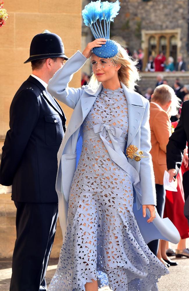 Poppy Delevingne arrives to attend the wedding of Britain's Princess Eugenie of York to Jack Brooksbank at St George's Chapel, Windsor Castle, in Windsor, on October 12, 2018. (Photo by Matt Crossick / POOL / AFP)