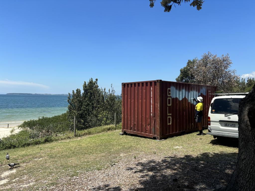 Work has started on painting the container with an environmentally themed mural. Picture: Thomas Henry