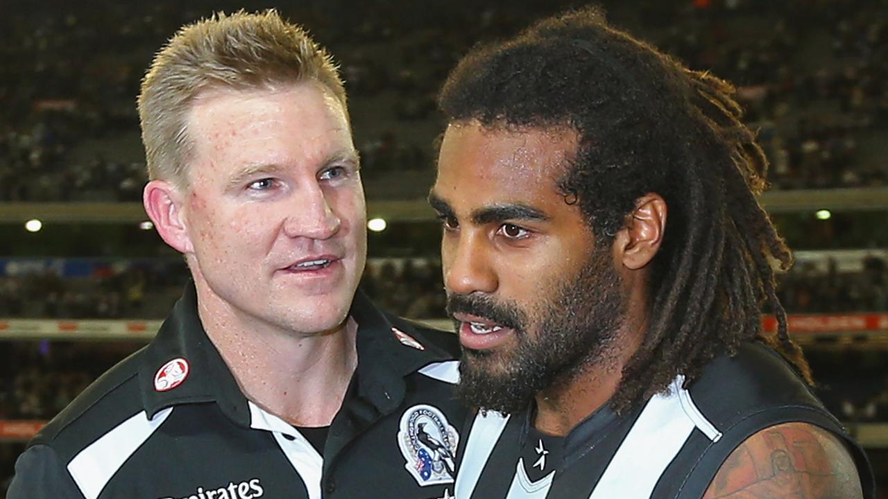 Nathan Buckley and Heritier Lumumba celebrate a victory in 2013. Photo by Quinn Rooney/Getty Images.