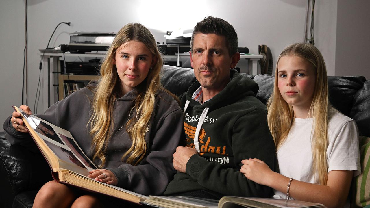 Lee Lovell and his daughters Scarlett (oldest) and Kassie at their home in North Lakes Brisbane. Picture: Lyndon Mechielsen