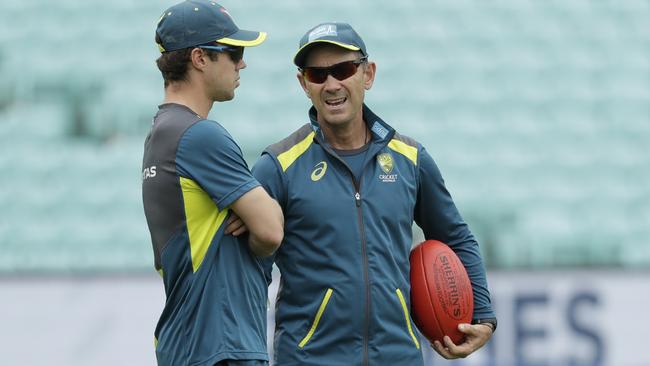 Australia head coach Justin Langer, right, talks to Travis Head, after dropping the batsmanm for the fifth Ashes Test against England the Oval. Picture: Matt Dunham.