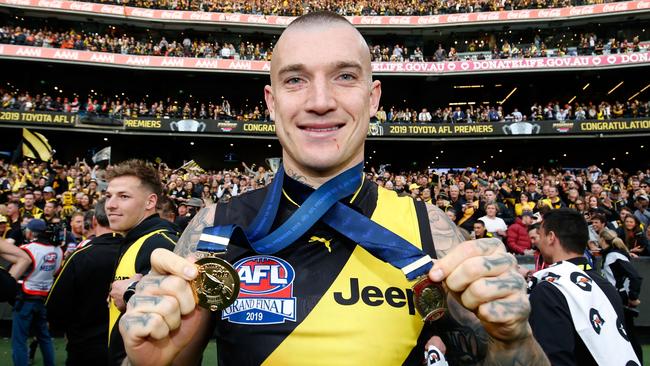 Martin with his 2019 premiership and Norm Smith medals. Picture: Darrian Traynor/AFL Photos/via Getty Images