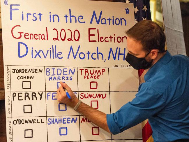 Residents of Dixville Notch, New Hampshire, are the very first Americans to cast their ballots on election day, doing so just after the stroke of midnight. The long-running tradition has become a major media event for US networks. Picture: AFP