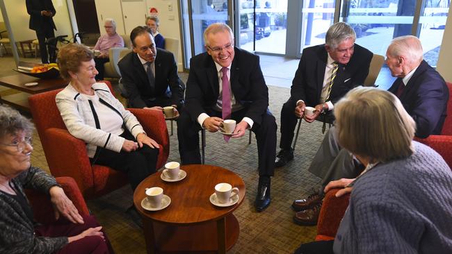 Mr Morrison speaks to residents during a visit to a Goodwin Retirement Village in Canberra.