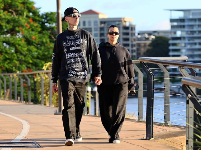 Travis Barker and Kourtney Kardashian on the Riverwalk. Picture: WP Media