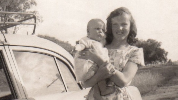 Gwen Grover holding her baby sister Sue, who was 19 years old at the time of hear death in 1983. Picture: Supplied