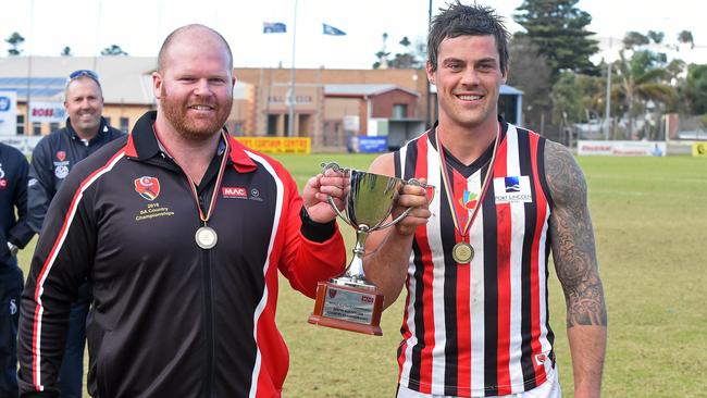 Adam Merrett (left) as coach of the South East zone team. Picture: Tom Huntley