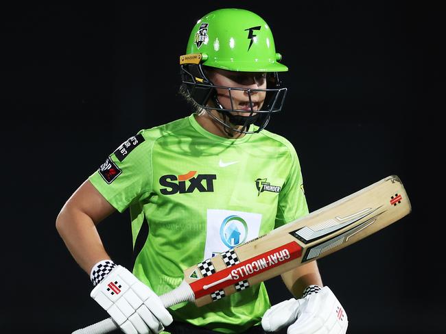 SYDNEY, AUSTRALIA - NOVEMBER 18: Phoebe Litchfield of the Thunder walks from the field after being dismissed during the Women's Big Bash League match between the Sydney Sixers and the Sydney Thunder at North Sydney Oval, on November 18, 2022, in Sydney, Australia. (Photo by Matt King/Getty Images)