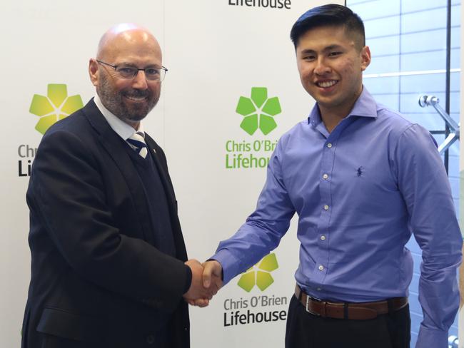 Liberal Senator Arthur Sinodinos with sarcoma survivor Anthony Chu.