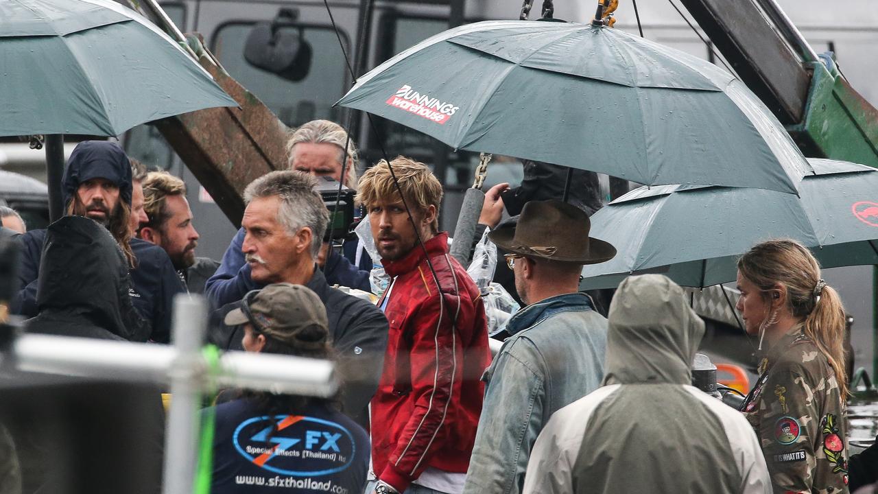 Busted! One, two, three Bunnings brollies in close proximity to Ryan Gosling. Picture: The Daily Telegraph/ Gaye Gerard