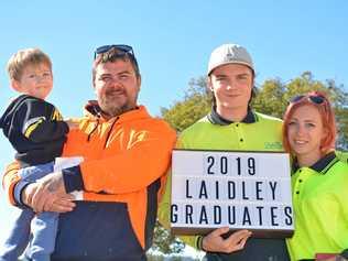 NEXT CHAPTER: Daryl Cowling (with his son), Corey Chance and Kristel graduate from the Laidley Construction Skilling Queenslanders for Work program. Picture: Ebony Graveur