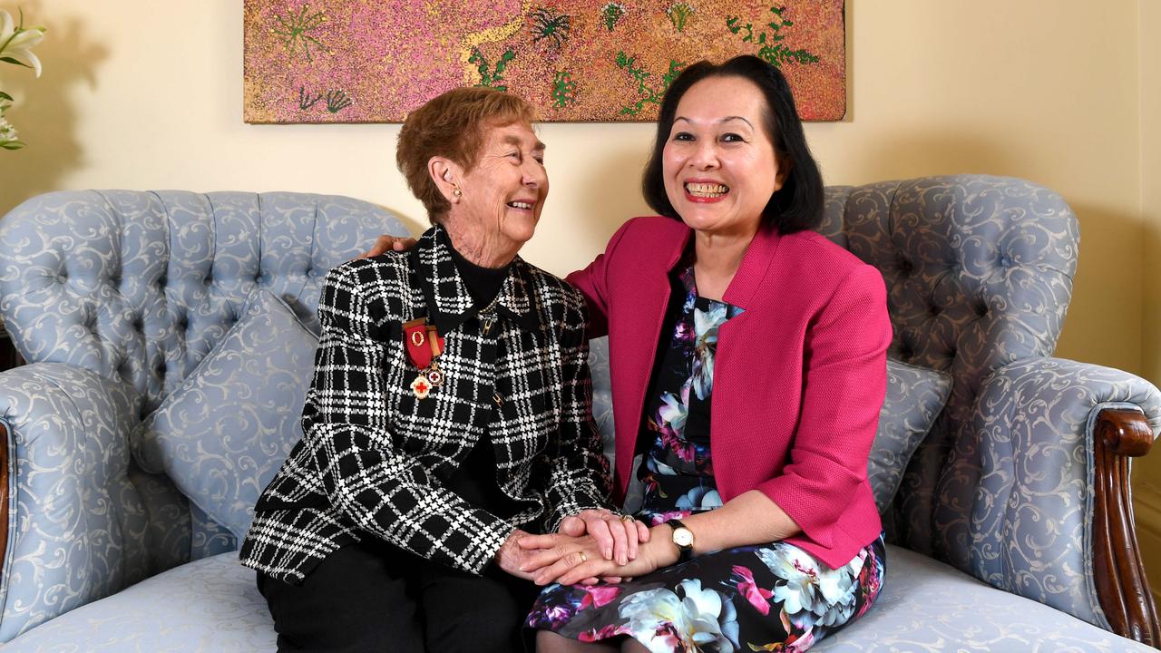 Red Cross Volunteer Val Broadbent with Mrs Lan Le. Picture: Tricia Watkinson.