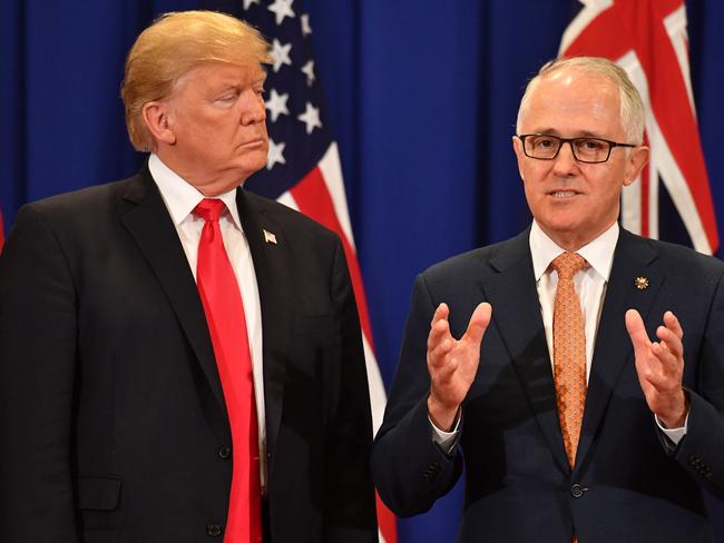 United States President Donald Trump and Australian Prime Minister Malcolm Turnbull are seen at the ASEAN forum in Manila. Picture: AAP