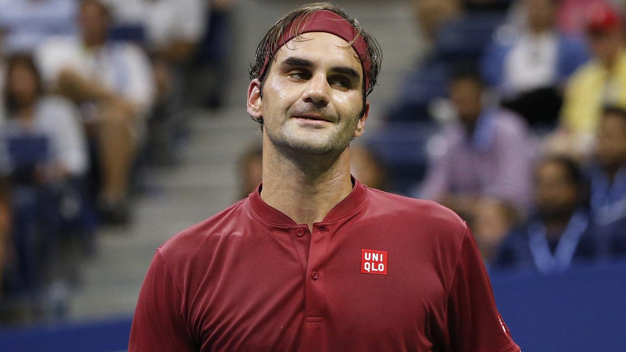 Roger Federer cuts a dejected figure after losing a point to John Millman.