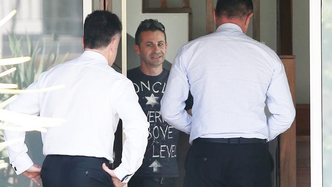 Mr Koletti has been assisting detectives pictured arriving at the couple’s Dover Heights home a week after his wife disappeared. Picture: Richard Dobson