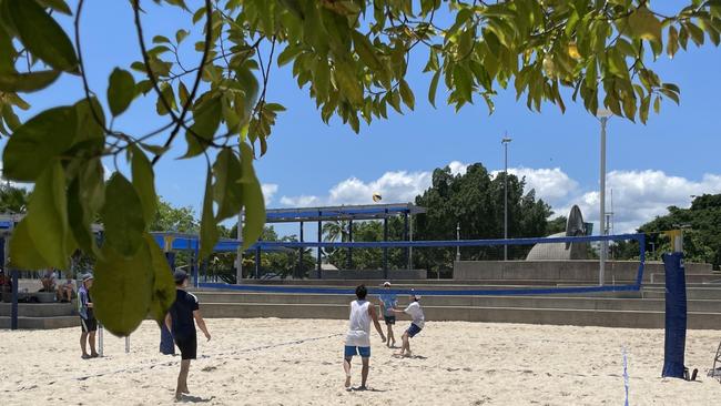 Playing beach volleyball on the sand courts on Cairns Esplanade. Picture: Alison Paterson