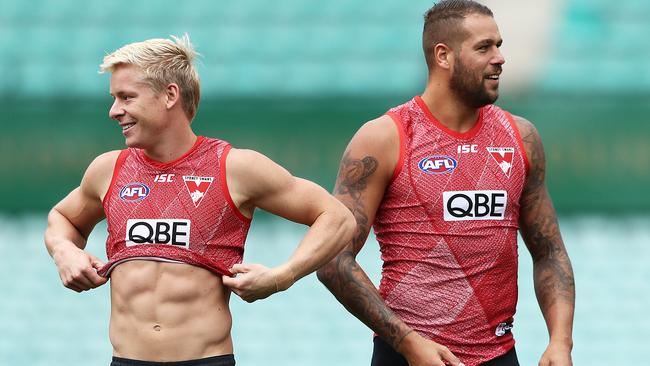 The blond and the Buddy! Isaac Heeney has his work cut out with Lance Franklin on the sidelines. Picture: Getty Images