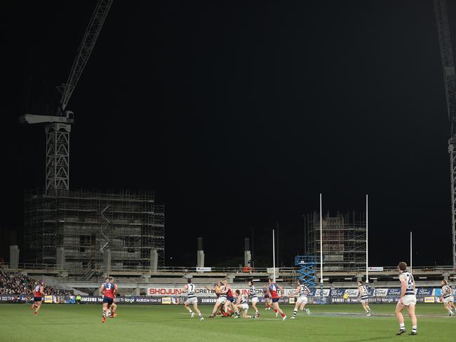 Geelong and Melbourne play under cranes last week. Picture: Robert Cianflone/Getty Images