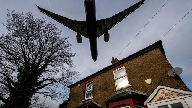 Aircraft come in to land at Heathrow airport over nearby houses in London. Picture: Getty Images