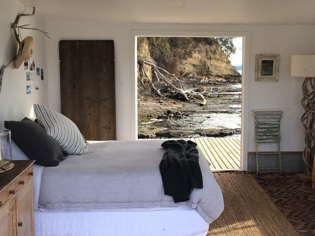 The bedroom inside the boathouse.