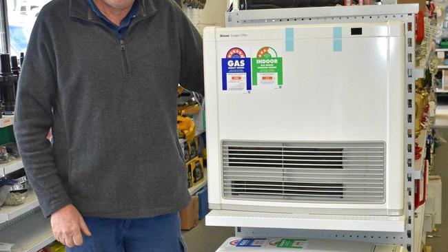 CLEAN MACHINE: Remo Raccanello shows off his Rinnai gas heaters. Picture: DEIRDRE SMITH