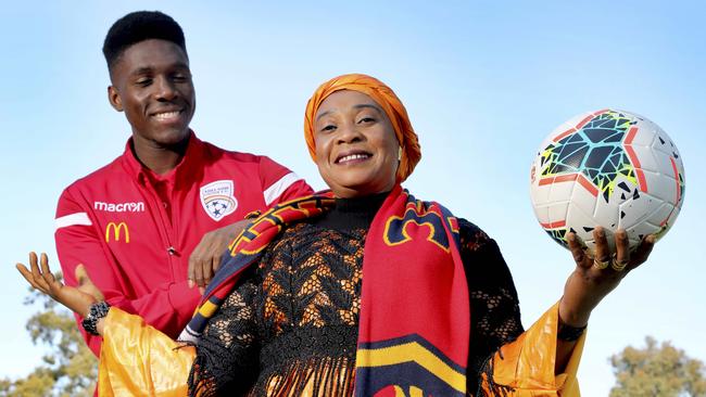 African-born Adelaide United forward Al Hassan Toure with his mother, Mawa, who he has dedicated his FFA Cup goalscoring heroics to. Picture: Dean Martin