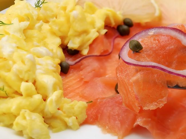 Scrambled eggs and smoked salmon will help to stave off hunger pangs ... until the turkey is served. Picture: istock