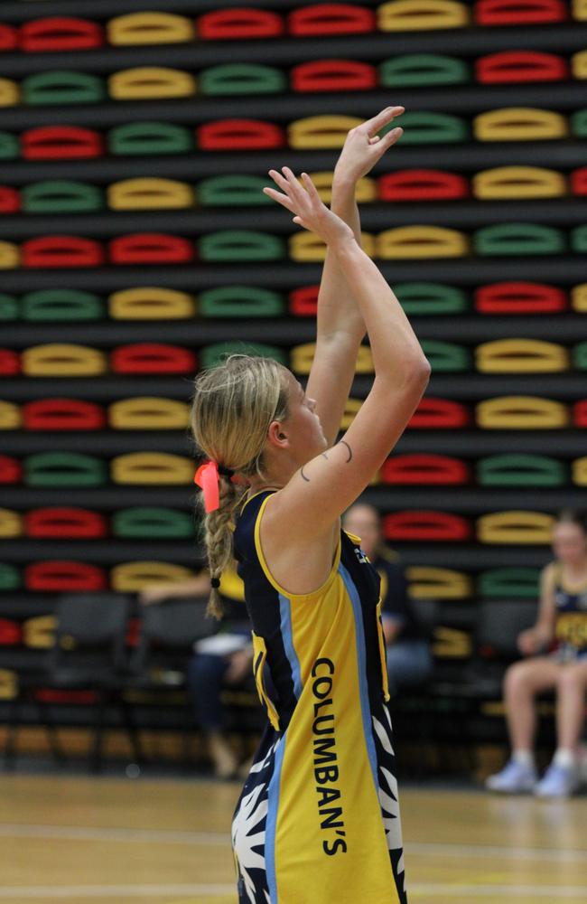 Netball action at QISSN 2024 held in Townsville. St Columbans College v Downlands College