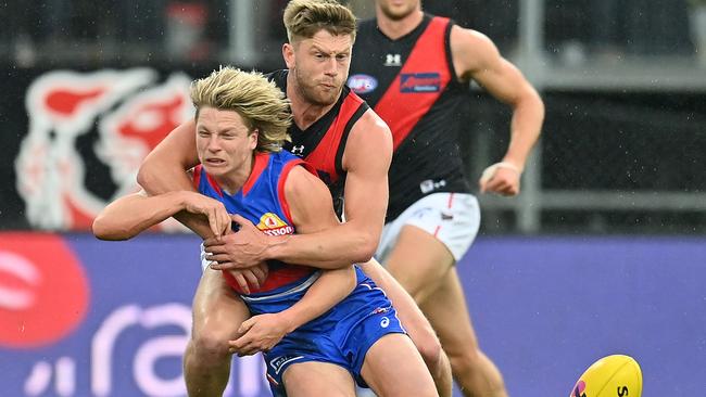 Jayden Laverde catches Bulldogs forward Cody Weightman high during last season’s elimination final.