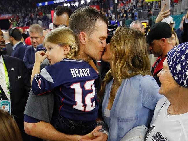 FILE - OCTOBER 28: Tom Brady and Gisele BÃÂ¼ndchen announce their divorce after 13 years of marriage on October 28, 2022. HOUSTON, TX - FEBRUARY 05:  Tom Brady #12 of the New England Patriots celebrates with wife Gisele Bundchen and daughter Vivian Brady after defeating the Atlanta Falcons during Super Bowl 51 at NRG Stadium on February 5, 2017 in Houston, Texas. The Patriots defeated the Falcons 34-28.  (Photo by Kevin C. Cox/Getty Images)