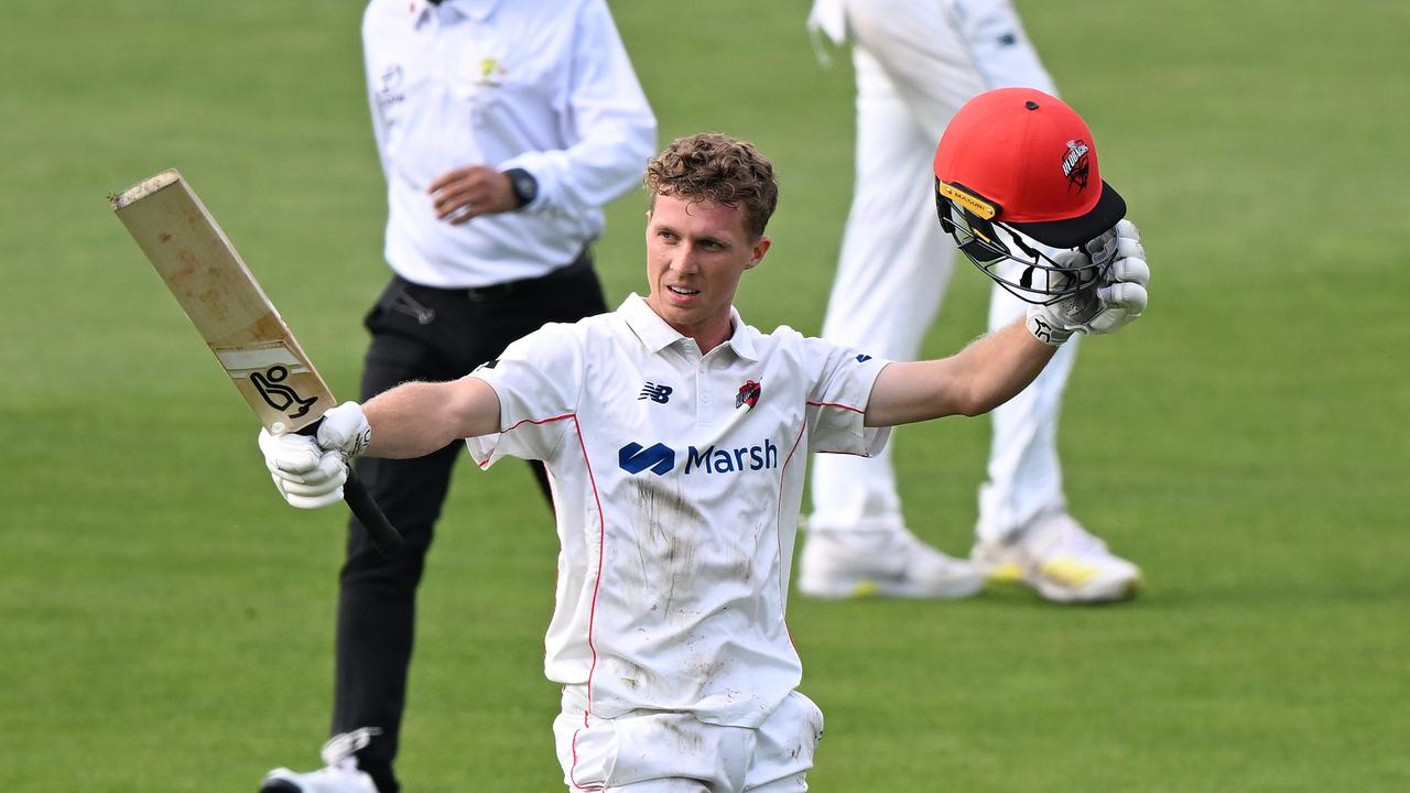 Nathan McSweeney celebrates a century in the Shield match against Tasmania. (Photo by Steve Bell/Getty Images)