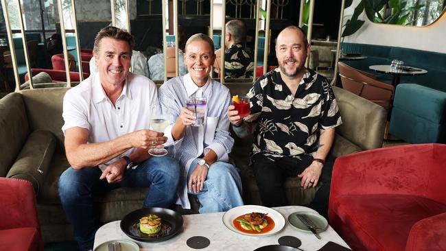 Chef Carl Jensen (whites) with wife Brooke Jensen and General Manger Josh Metcalfe at their Cronulla venue Papa J's. Picture: Rohan Kelly