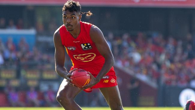 Lloyd Johnston of the Suns in action during the 2023 AFL Round 23 match between the Gold Coast SUNS and Carlton. Picture: Russell Freeman/AFL Photos via Getty Images