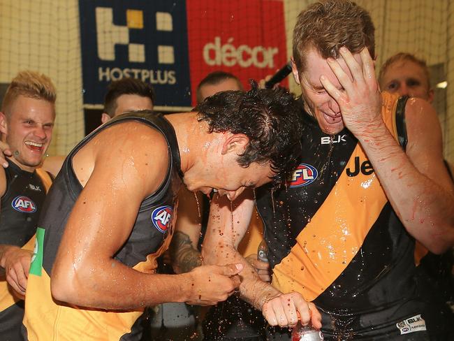 Daniel Rioli and Jacob Townsend celebrate their first wins in Richmond colours. Picture: Wayne Ludbey.