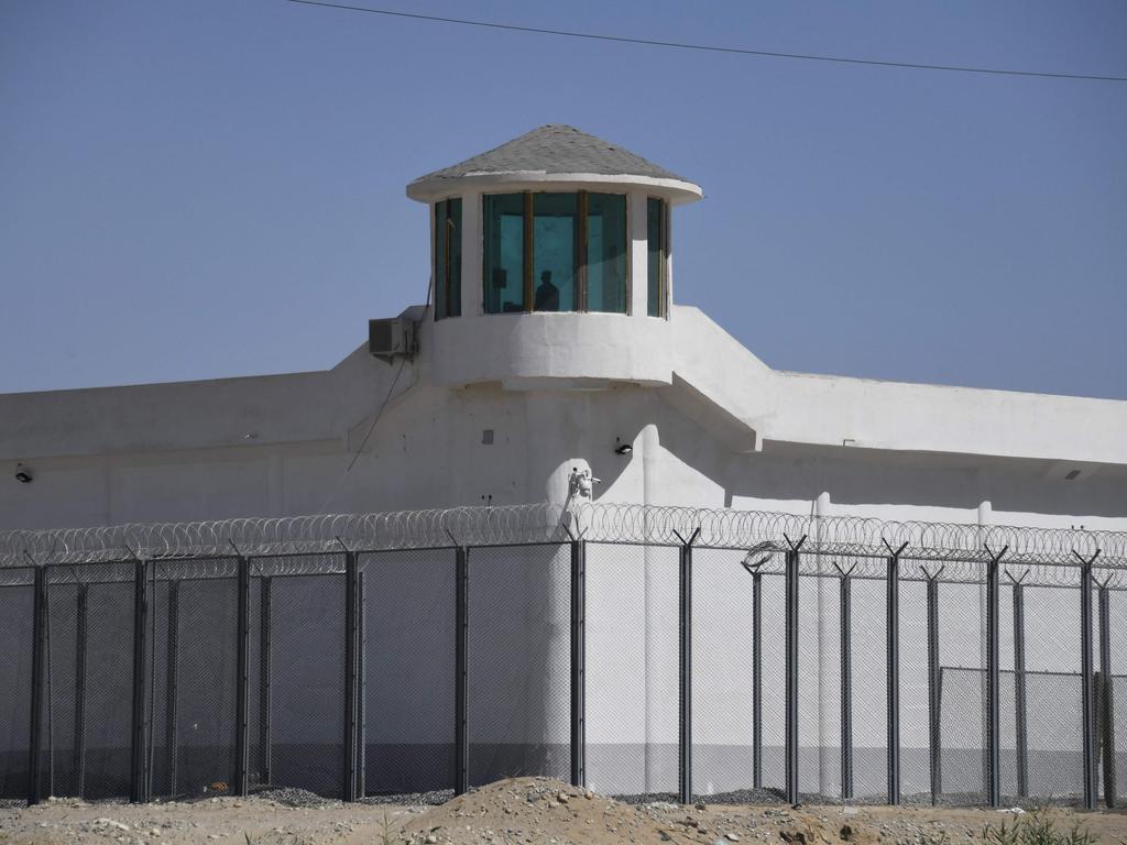 This file photo taken on May 31, 2019 shows a watchtower on a high-security facility near what is believed to be a re-education camp where mostly Muslim ethnic minorities are detained, on the outskirts of Hotan, in China's northwestern Xinjiang region.