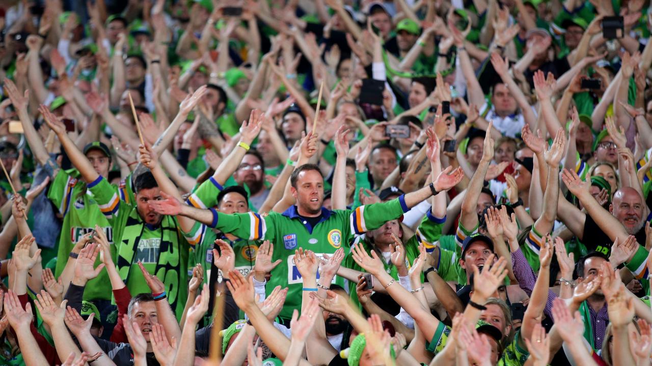 Raiders fans perform their pre-game ritual. Picture: Jonathan Ng