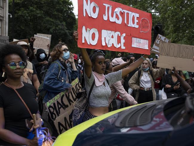 A police van is pushed back by demonstrators during a Black Lives Matter protest in London, United Kingdom. Picture: Getty Images