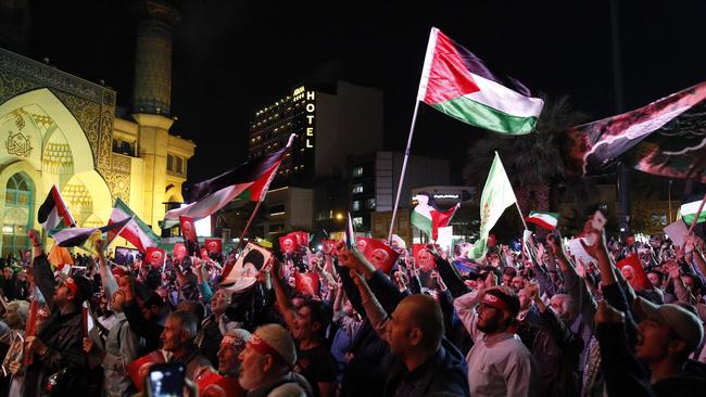 Iranians attend a gathering in Tehran on October 7, 2023, to express their solidarity with Palestine after Hamas militants launched a deadly air, land and sea assault into Israel from the Gaza Strip. Picture: AFP