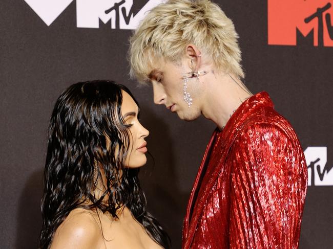 FILE - JANUARY 12: Actress Megan Fox and musician Machine Gun Kelly are engaged. NEW YORK, NEW YORK - SEPTEMBER 12: (L-R) Megan Fox and Machine Gun Kelly attend the 2021 MTV Video Music Awards at Barclays Center on September 12, 2021 in the Brooklyn borough of New York City. (Photo by Jamie McCarthy/Getty Images for MTV/ ViacomCBS)