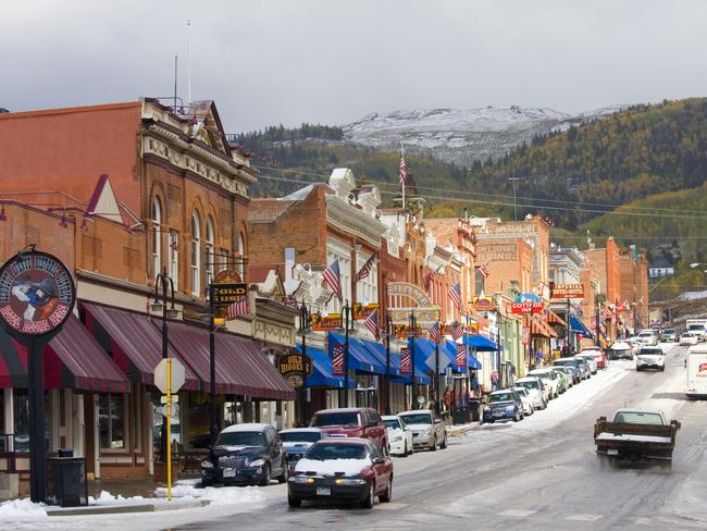 Historic mining and gambling town of Cripple Creek Colorado on a snowy autumn afternoon.