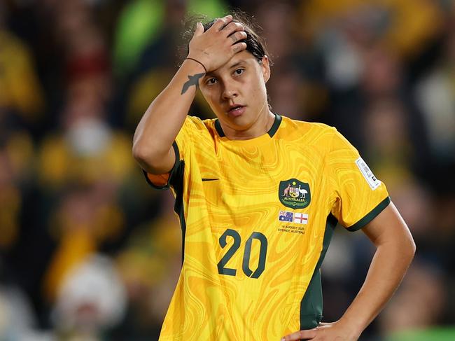 SYDNEY, AUSTRALIA - AUGUST 16: Sam Kerr of Australia reacts after England's second goal  during the FIFA Women's World Cup Australia & New Zealand 2023 Semi Final match between Australia and England at Stadium Australia on August 16, 2023 in Sydney, Australia. (Photo by Alex Pantling - FIFA/FIFA via Getty Images)