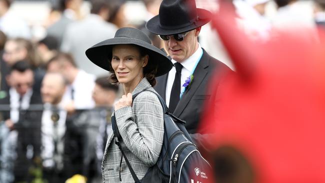 Dr. Grace Forbes watching horses in the mounting yard at Flemington with steward Rex Terp. Picture: Michael Klein