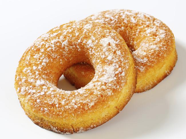 TASTE MATT PRESTON:  two fresh donuts isolated on white background