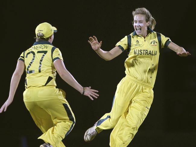 Bowling on basically one leg, Perry inspires the Aussies to victory in the 2013 World Cup. Picture: AP Photo/Rafiq Maqbool