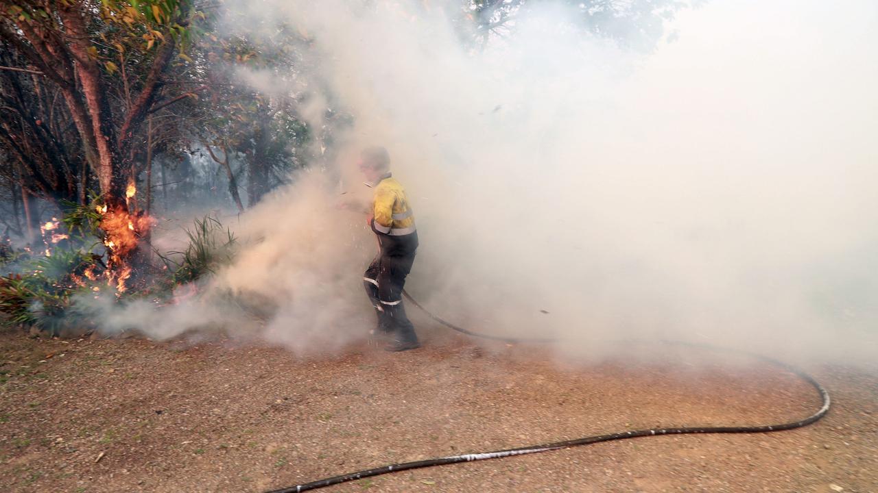 Fireys save homes in and around the village of Killabakh. Picture: Gary Ramage