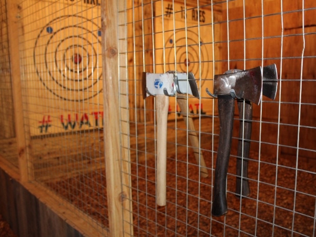 A World Axe Throwing League competition  and regular axe ready for action at 13 Axes Axe Throwing Australia in Cleveland. Picture: Marcel Baum